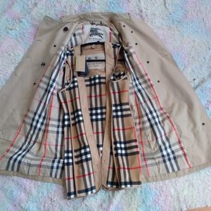 Woman's Burberry coat and vest pair